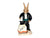 The bunny is wear[ng a black suit with white buttons, a green bow tie and cummerbund. He is lifting a white bunny from a black top hat.